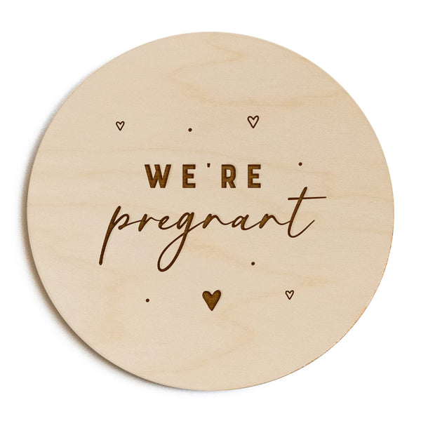 The Cotton and Canvas Co. We're Pregnant Baby Announcement Sign